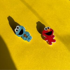 Red and Blue Character Pins